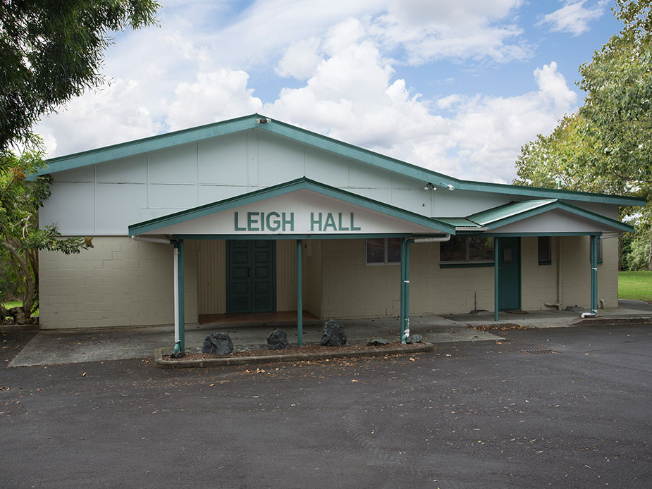 Single-storey hall with Leigh Hall signage and covered entry