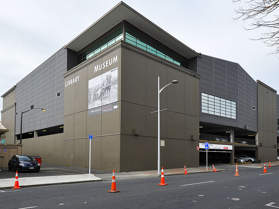Multi-storey library and museum building exterior on street corner