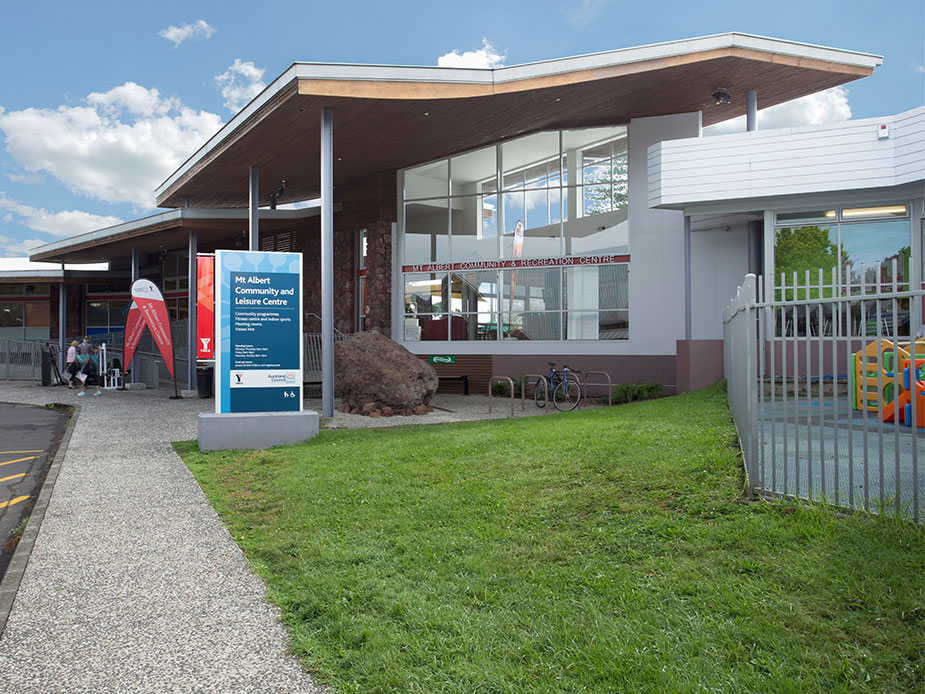 Community and leisure centre entrance with canopy, signage and landscaping