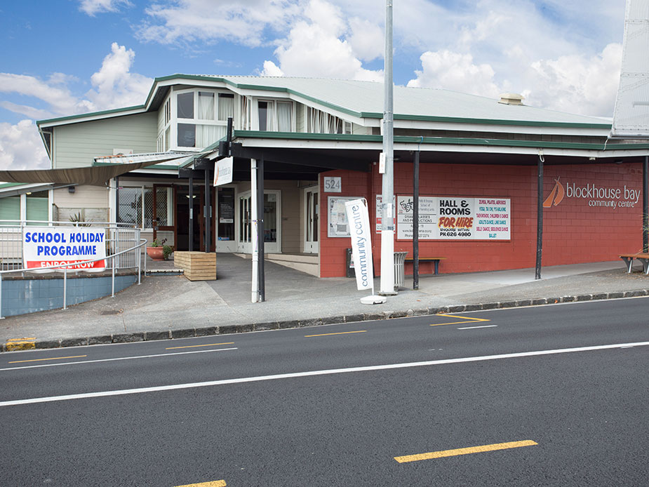Community centre building on main road with signage for hall hire