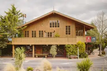 Exterior of Powderhorn Chateau, a two-storey timber alpine chalet
