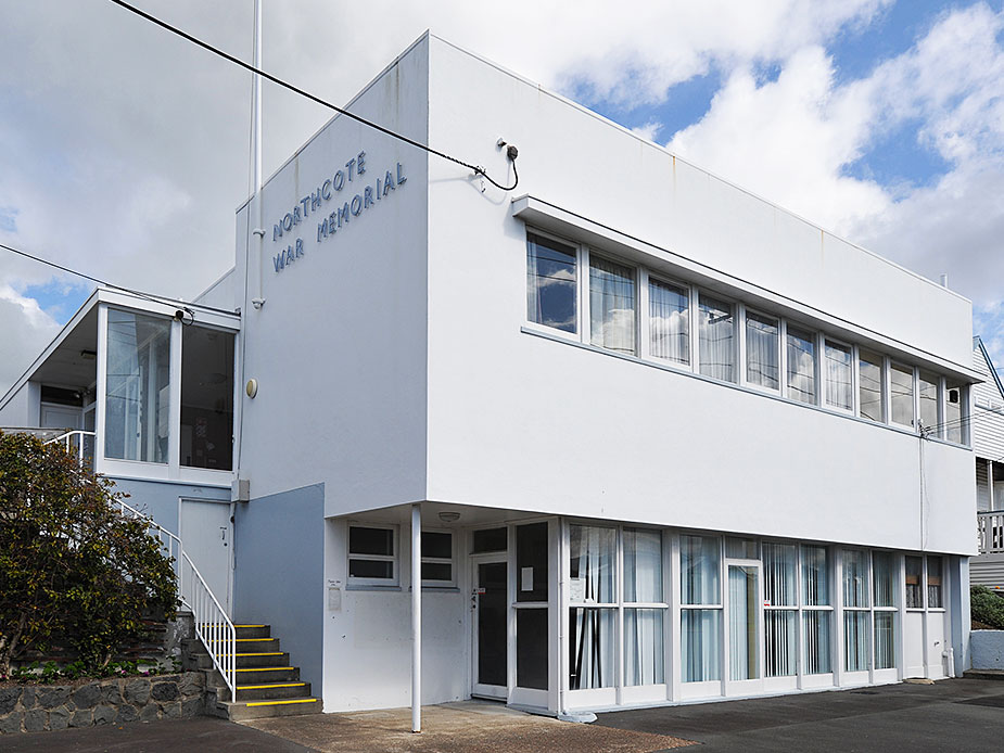 Two-storey white rendered building with signage reading Northcote War Memorial
