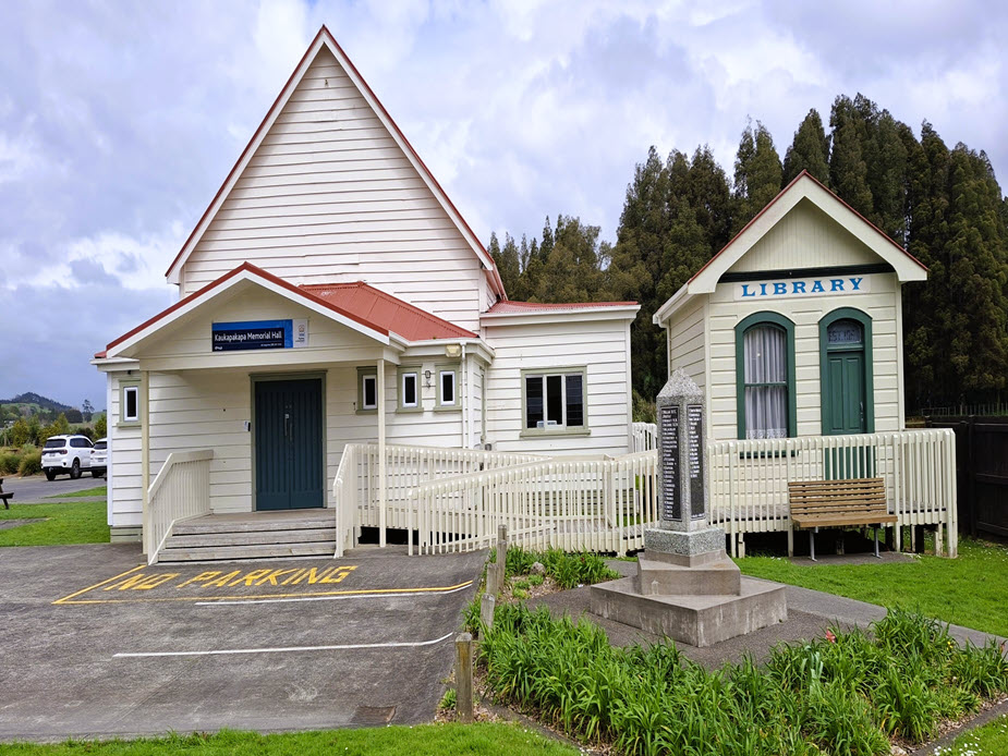 White timber memorial hall and adjacent library building