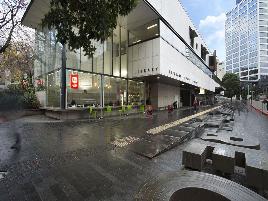 Auckland City Library exterior with glass facade and street-level seating