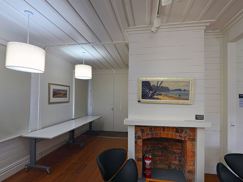 Heritage room interior with fireplace, timber floor and pendant lights